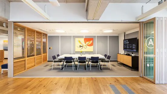 Busan WeWork conference room equipped with a wall-mounted collaboration display