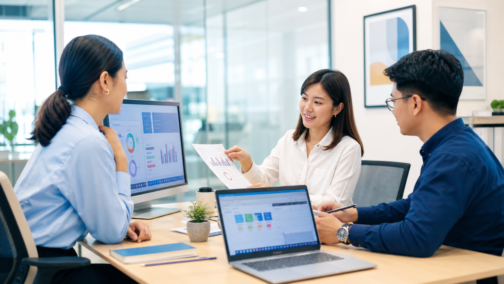 Business team collaborating with Microsoft 365 desktop productivity tools